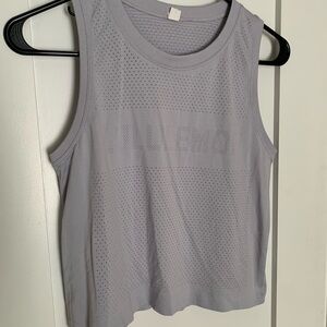 40. Size 4 LULULEMON Breeze By Spell Out Tank In Silver Lilac